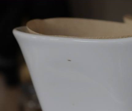 Mismatched cups and tea pieces inside Lukaya Cafe
